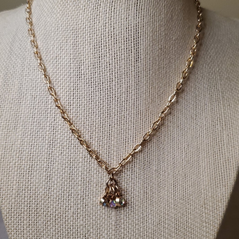 Gold plated necklace with 3 crystal charms.